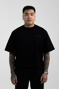 UA Cursive FCO Black tee on model editorial