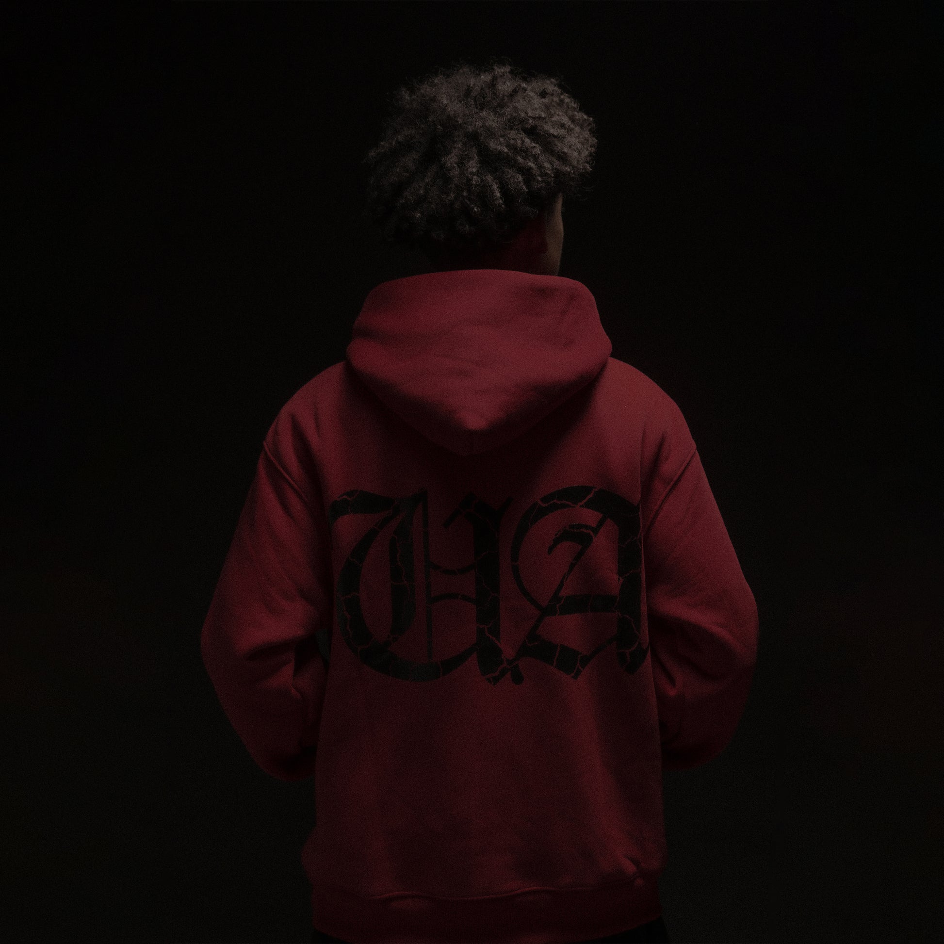 Model in UA Wine Red hoodie